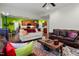 Open floor plan showing the living room and kitchen area with stainless steel appliances and hardwood floors at 100 Lexington Ave, Zebulon, NC 27597