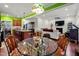 Open floor plan showcasing the kitchen, dining area, and living room with fireplace feature at 100 Lexington Ave, Zebulon, NC 27597