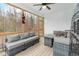 Relaxing screened porch with comfortable seating and outdoor ambiance at 100 Lexington Ave, Zebulon, NC 27597