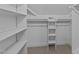 Walk-in closet with built in shelving, a clothes rod, and neutral carpeting at 100 Lexington Ave, Zebulon, NC 27597