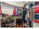 Walk-in closet with custom shelving, racks, and organization system at 100 Lexington Ave, Zebulon, NC 27597