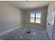 Bedroom with a large window and natural light at 100 Spumante Ct, Princeton, NC 27569