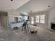 Bright, spacious kitchen featuring white cabinets, a large island, and modern fixtures at 100 Spumante Ct, Princeton, NC 27569