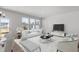 Bright living room with ample seating, a modern coffee table, and a large window view at 1004 Westerland Way # 197, Durham, NC 27703