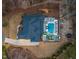 Aerial view of the house and its landscaping including a pool, lighting and outdoor furniture at 1012 Casa Dega Way, Raleigh, NC 27613