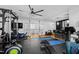 Spacious home gym with high ceilings, ceiling fan, access to natural light and top-notch fitness equipment at 1012 Casa Dega Way, Raleigh, NC 27613