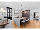 Spacious kitchen with a center island, stainless steel appliances, and modern pendant lighting at 1012 Casa Dega Way, Raleigh, NC 27613