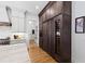 Kitchen features stainless steel appliances, marble countertops and a large custom refrigerator at 1012 Casa Dega Way, Raleigh, NC 27613