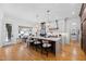 Well-lit kitchen featuring a center island with barstool seating and an eat-in nook at 1012 Casa Dega Way, Raleigh, NC 27613