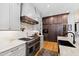 Elegant kitchen showcasing stainless steel appliances, granite countertops, and custom vent hood at 1012 Casa Dega Way, Raleigh, NC 27613