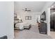 Spacious main bedroom with carpet flooring, ceiling fan, dresser, and ensuite bathroom at 1012 Casa Dega Way, Raleigh, NC 27613