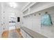 Mudroom features built in bench with storage, coat hooks, and access to kitchen at 1012 Casa Dega Way, Raleigh, NC 27613