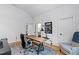 Bright office features hardwood floors, a large desk, modern chair, and ample natural light at 1012 Casa Dega Way, Raleigh, NC 27613