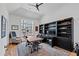 Spacious office with custom shelving, large window, modern desk, and natural light at 1012 Casa Dega Way, Raleigh, NC 27613
