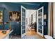 View through French doors into a light-filled living room at 1012 Casa Dega Way, Raleigh, NC 27613