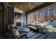Covered outdoor patio featuring lounge areas with fireplace and an outdoor pool at 1012 Casa Dega Way, Raleigh, NC 27613