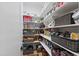 Well-organized walk-in pantry with custom shelving and storage baskets at 1012 Casa Dega Way, Raleigh, NC 27613