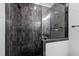 Modern shower with sleek tile, glass enclosure, and contemporary fixtures at 1012 Casa Dega Way, Raleigh, NC 27613