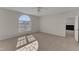 Light filled bedroom with large arched window with view and neutral carpeting at 103 Fieldstone Dr, Clayton, NC 27520
