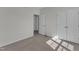 Bedroom featuring a closet with double doors and carpet flooring at 103 Fieldstone Dr, Clayton, NC 27520