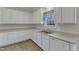 Bright kitchen featuring modern appliances, ample cabinet space, and a view from the window at 103 Fieldstone Dr, Clayton, NC 27520