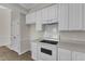 This kitchen is equipped with appliances, counter space, and plenty of room to cook at 103 Fieldstone Dr, Clayton, NC 27520