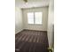 Neutral bedroom features carpet, double window that brings in lots of light at 105 Cross Hill Ln, Holly Springs, NC 27540