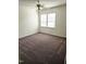 Cozy bedroom featuring neutral carpet, ample natural light, and plenty of space at 105 Cross Hill Ln, Holly Springs, NC 27540