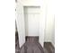 Bedroom closet includes wire shelving and open doors for easy access at 105 Cross Hill Ln, Holly Springs, NC 27540