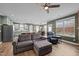 Open-concept living area with hardwood floors, a comfortable seating area, and a view of the kitchen at 106 Jared Ct, Graham, NC 27253