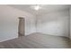 Neutral bedroom with three doors and neutral carpeting features ceiling fan at 112 Central Townes Way # 294, Raleigh, NC 27603