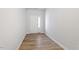 Inviting entry hallway featuring wood floors, neutral paint, and lots of natural light at 112 Central Townes Way # 294, Raleigh, NC 27603