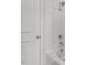 Bathroom highlighting tiled shower and tub, with a linen closet and door at 116 Central Townes Way # 293, Raleigh, NC 27603