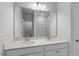 Bathroom featuring double vanity sinks with a large mirror and bright lighting at 116 Central Townes Way # 293, Raleigh, NC 27603