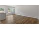 Spacious dining area with hardwood floors and large windows allowing plenty of natural light at 116 Central Townes Way # 293, Raleigh, NC 27603