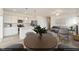 Bright, open-concept kitchen and living area with stainless steel appliances and modern finishes at 116 Central Townes Way # 293, Raleigh, NC 27603