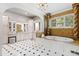 The bathroom boasts a jacuzzi tub, double vanities, granite countertops, and mosaic tile accents at 12132 Lockhart Ln, Raleigh, NC 27614