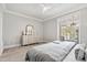 The bedroom features carpet floors, natural light, a closet, and a ceiling fan at 12132 Lockhart Ln, Raleigh, NC 27614