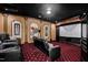 Entertainment room complete with comfortable seating, projector, and screen at 12132 Lockhart Ln, Raleigh, NC 27614