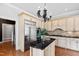 Modern kitchen boasts stainless steel appliances and an open layout, perfect for entertaining at 12132 Lockhart Ln, Raleigh, NC 27614