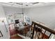 Bright living room offers a fireplace, hardwood floors, and plenty of natural light from the large windows at 12132 Lockhart Ln, Raleigh, NC 27614