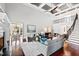 Bright living room with fireplace, view of the dining room, and elegant decor at 12132 Lockhart Ln, Raleigh, NC 27614