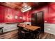 A stylish wine cellar equipped with elegant lighting, custom wall and floor and ample space for storing and enjoying wines at 12132 Lockhart Ln, Raleigh, NC 27614