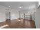 Living room offers hardwood flooring, natural light, and neutral paint at 1254 White Flint Cir, Durham, NC 27703