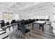 Bright meeting room with ample seating, natural light, and neutral tones creating a professional and comfortable environment at 1254 White Flint Cir, Durham, NC 27703