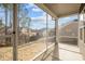 Relaxing screened patio with views of lush landscaping and neighborhood scenery at 1254 White Flint Cir, Durham, NC 27703