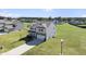 Aerial view of the two-story home, showcasing its well-manicured lawn and neighborhood at 147 Young Farm Dr, Lillington, NC 27546