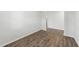 An empty bedroom featuring hardwood floors and a simple design ready for personalization at 147 Young Farm Dr, Lillington, NC 27546