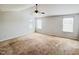 Spacious bedroom with three large windows and a ceiling fan at 147 Young Farm Dr, Lillington, NC 27546