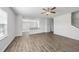 Expansive living area with hardwood floors and an easy transition to the upper level at 147 Young Farm Dr, Lillington, NC 27546